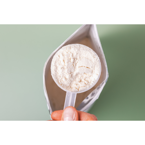 A scoop of natural plant-based powdered formula